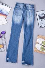 Distressed Flared Jeans with Pockets